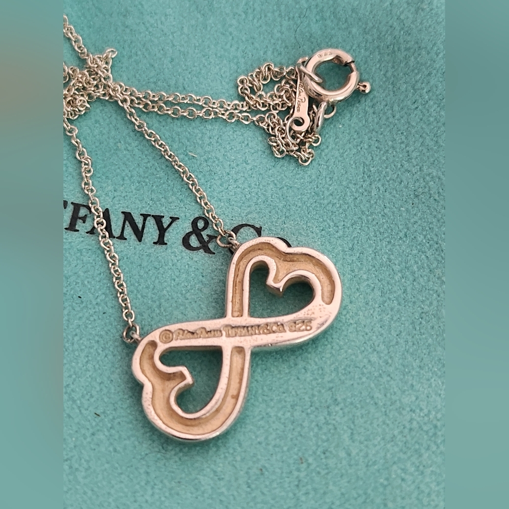 Authentic Tiffany double heart necklace.